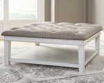 Kanwyn - Uph Ottoman Cocktail Table - Whitewash