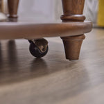 Bellevue - Round Coffee Table With Casters - Whiskey Brown