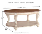 Realyn - Oval Cocktail Table - White / Brown